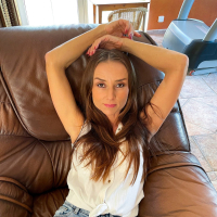 Gorgeous Little Renny with hot ass and small tits posing naked on the sofa