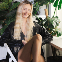 Skinny blonde Novella Night takes everything off and rides a dildo