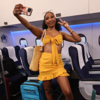 Horny ebony slut Olivia Jayy spreads legs to ride a dick on the plane
