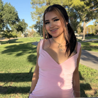 Kinky Laylei with natural tits having fun in the back of a car