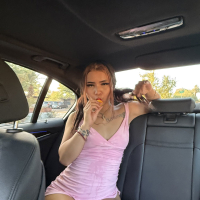 Kinky Laylei with natural tits having fun in the back of a car