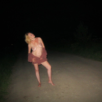 Blonde cutie Lady La Perle showing her naked body outdoors