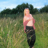 Blonde cutie Lady La Perle showing her naked body outdoors