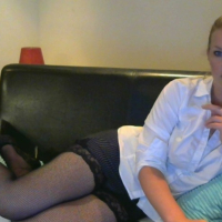 Blonde hottie Miss Veena posing in white shirt and black stockings
