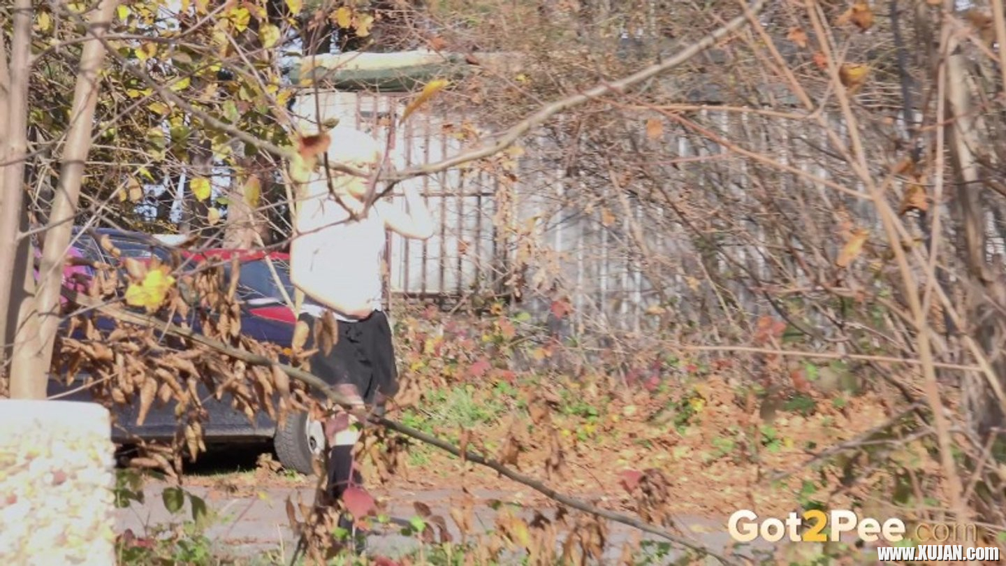 Lucy Shy in black Boots and Skirt peeing outdoors - Photo #3374624