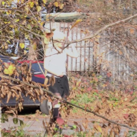 Lucy Shy in black Boots and Skirt peeing outdoors