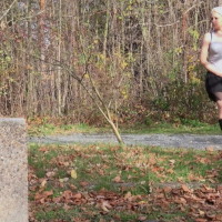 Lucy Shy in black Boots and Skirt peeing outdoors