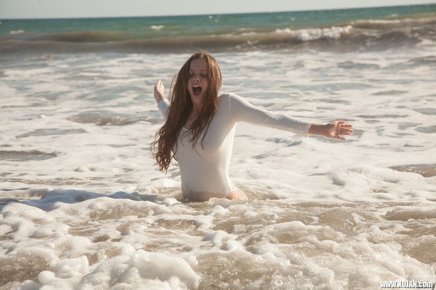 Busty Girl on Beach showing wet Boobs in Swimsuit - Photo #3377276