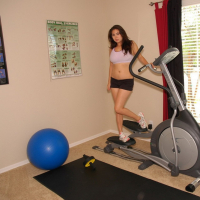 Sexy Mai Ly gets hot and strips during a Workout