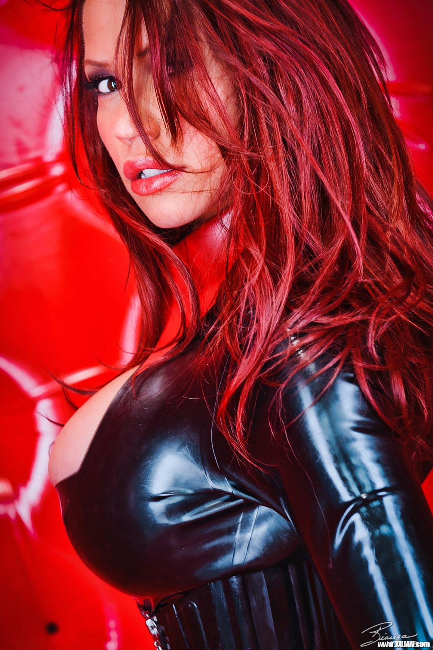 Feisty Bianca Beauchamp posing in a tight latex Suit - Photo #3385677