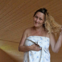 Sexy babe Lady La Perle covers herself with a sheet while posing