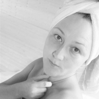Sexy babe Lady La Perle covers herself with a sheet while posing