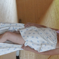 Sexy babe Lady La Perle covers herself with a sheet while posing