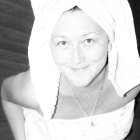 Sexy babe Lady La Perle covers herself with a sheet while posing