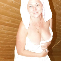 Sexy babe Lady La Perle covers herself with a sheet while posing