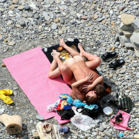 Naked Couple caught fucking on public nude Beach