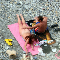 Naked Couple caught fucking on public nude Beach