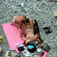 Naked Couple caught fucking on public nude Beach