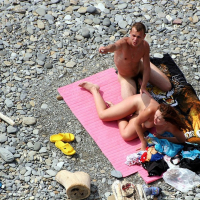 Naked Couple caught fucking on public nude Beach