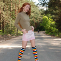 Redhead Chick showing her shaved Pussy in Public