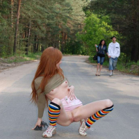 Redhead Chick showing her shaved Pussy in Public