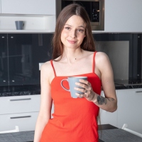 Solo brunette Angela Haddie with hot ass posing in the kitchen