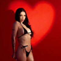 Tattooed Diana Melison with big natural tits wearing black stockings