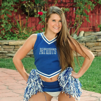 Sexy cheerleader Abby Rocks drops her uniform and spreads legs