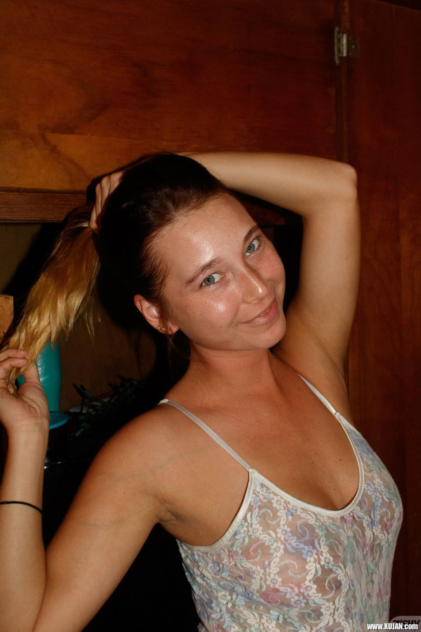 Brunette Renee Wilson having fun doing striptease and showing her tits - Photo #3393110