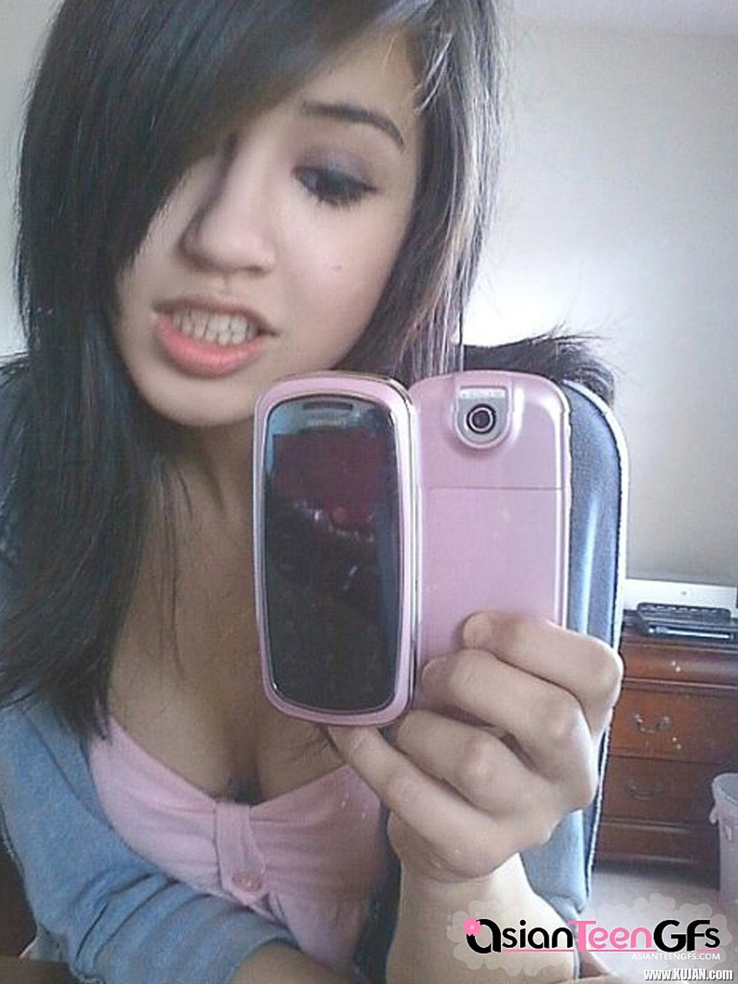 Asian Babe taking Cell Phone Pics of her sexy Tits - Photo #3402495