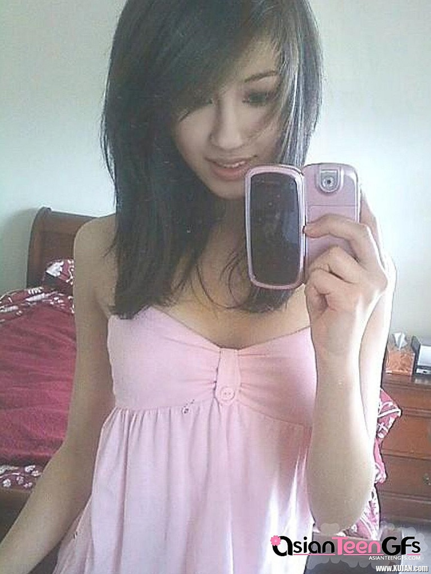 Asian Babe taking Cell Phone Pics of her sexy Tits - Photo #3402502