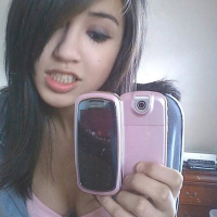 Asian Babe taking Cell Phone Pics of her sexy Tits