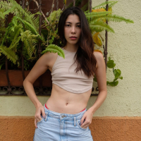 Solo Julia Campos having fun fingering her shaved twat in a park