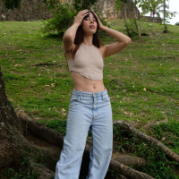 Solo Julia Campos having fun fingering her shaved twat in a park