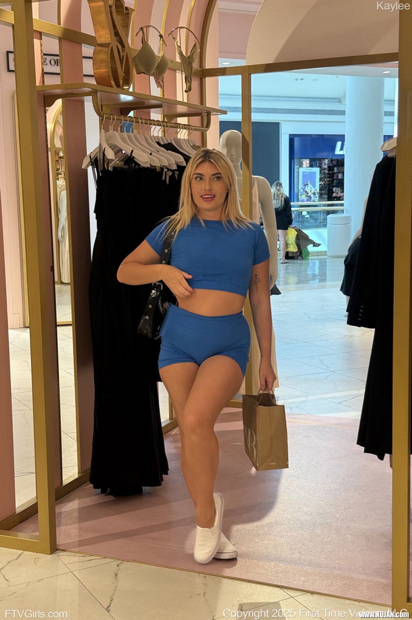 Naughty Kylie Ray with hot ass natural tits doing striptease in public - Photo #3407029