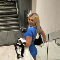 Naughty Kylie Ray with hot ass natural tits doing striptease in public
