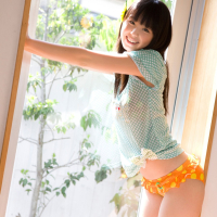 Cute Japanese chick Rina Koike smiles while posing for All Gravure