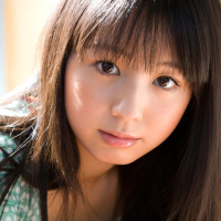 Cute Japanese chick Rina Koike smiles while posing for All Gravure