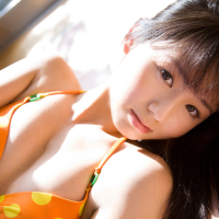 Cute Japanese chick Rina Koike smiles while posing for All Gravure