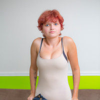Playful redhead babe Naomi Clark revealing her sexy naked curves