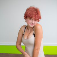 Playful redhead babe Naomi Clark revealing her sexy naked curves