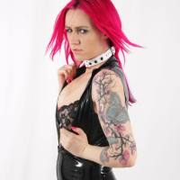Pink haired Model looking hot in Latex Bodysuit