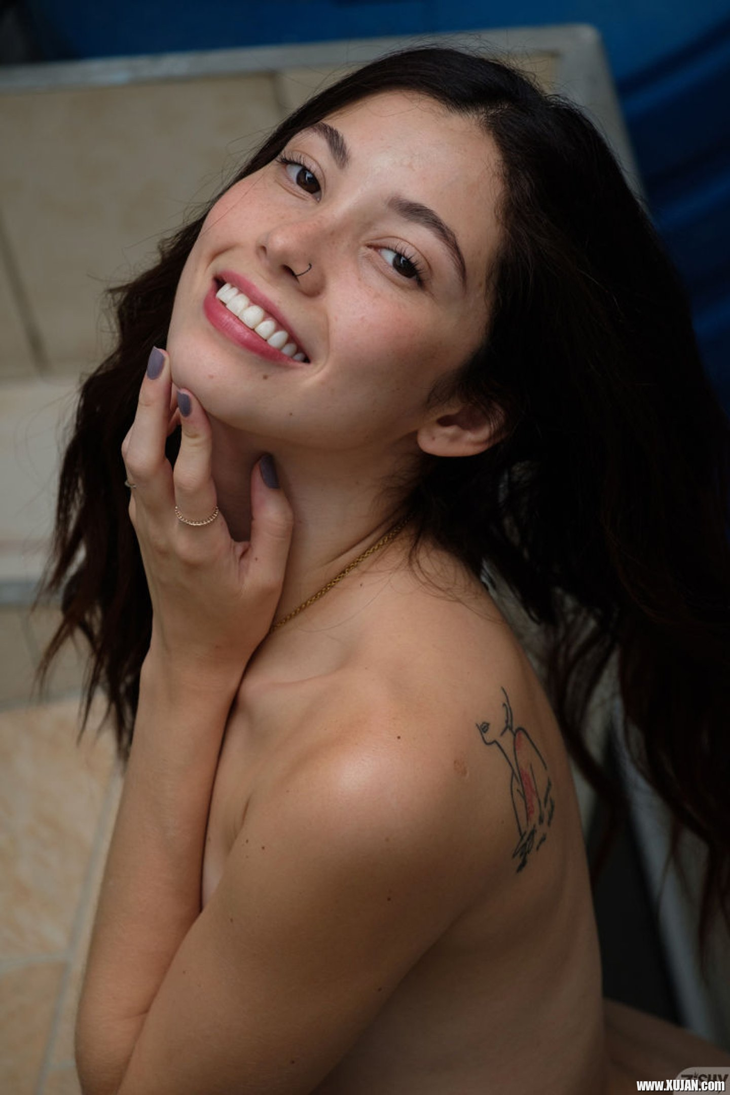 Brunette Julia Campos doing striptease and showing her boobs - Photo #3409945
