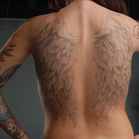 Hot babe Emily Parker shows off her super sexy tattooed body