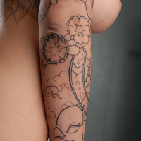 Hot babe Emily Parker shows off her super sexy tattooed body