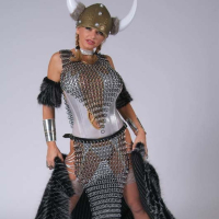 Vicky Vette posing and stripping as a hot Viking