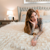 Tattooed Penny Archer fucks with male sex doll