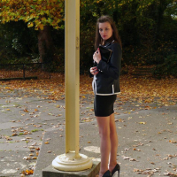 Gorgeous Gal posing outdoors wearing high Heels