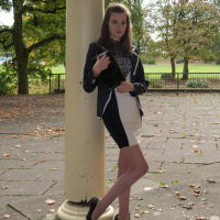 Gorgeous Gal posing outdoors wearing high Heels