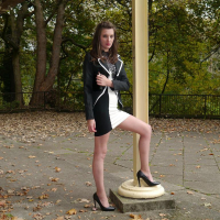 Gorgeous Gal posing outdoors wearing high Heels